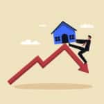 Property and housing market collapse, real estate stock risk. Home prices fall in real estate and property market crash. A businessman tries to keep the house from falling off the top of the graph price.