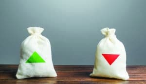 Two bags with green and red arrows up and down. Risk planning. Advantages and disadvantages. Useful and harmful. Decision making, evaluating profit consequences. Choice between positive and negative.