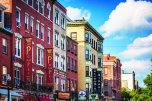 Brick tenements along Hanover Street, in the North End of Boston, Massachusetts in 2021