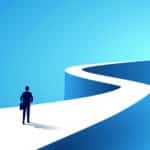 Business journey, businessman walking on long winding path going to success in the future concept