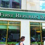 New York City, USA - July 27, 2018: Facade of a bank branch of First Republic Bank on the street with people around in Manhattan, New York City, USA