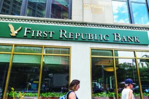 New York City, USA - July 27, 2018: Facade of a bank branch of First Republic Bank on the street with people around in Manhattan, New York City, USA