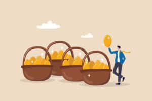 Diversification, investment portfolio strategy to reduce risk and maximize return, earning and profit, asset allocation concept, businessman holding golden eggs diversify by putting in many baskets.