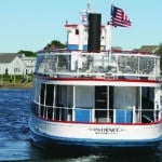 A quaint ferry boat underway in Hyannis Harbor, on Cape Cod.