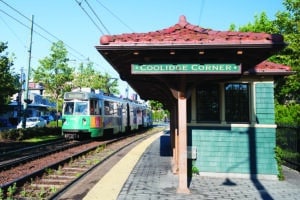 Brookline, USA - August 3, 2011: Coolidge Corner, MBTA Stop The "C" line is going by the antique Coolidge Corner shelter on a sunny, summer day.