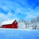 A red barn after a snow storm