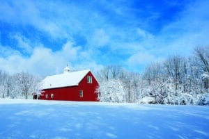 A red barn after a snow storm