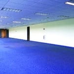 empty office building interior with furniture removed before renovation
