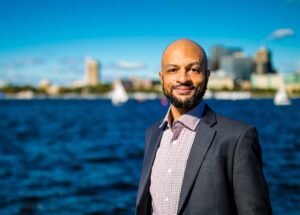 Colliers Boston research director Jeff Myers poses for a photo in front of the Charles River Basin in Boston.