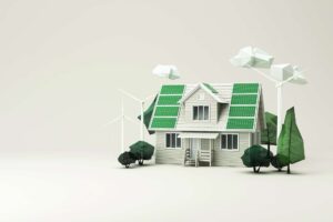 A model of a house covered in solar panels sits next to wind turbines.