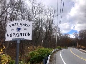 a photo of a sign saying "entering hopkinton"