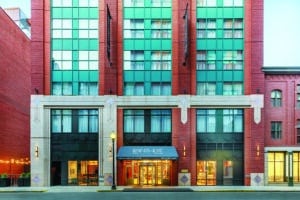 a photo of the front door of the Pennyweight Hotel in Boston