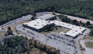 A Google Maps screenshot showing the former Dell EMC campus in Southborough: a nearly 200,000-square-foot, single-story exurban office-industrial building surrounded by parking and trees.