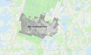 A map shows the "Cantonment Area" section of Joint Base Cape Cod. The southern third of the huge base contains the Otis Air National Guard Base and Coast Guard aviation facilities, plus a small amount of housing and other infrastructure.