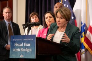 Gov. Maura Healey fields questions from reporters about her fiscal year 2026 budget proposal on Jan. 22, 2025.