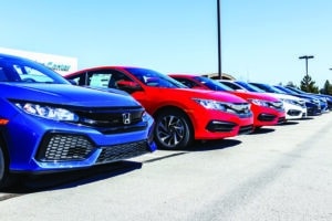 Indianapolis - Circa March 2018: Honda Motor Co. cars lined up in a dealership lot