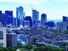 Boston, MA, US - August 11th 2024: The view of Longfellow Bridge and the Boston downtown. A nice weather that makes the photograph clear. You can see the main Beacon Hill area is surrounded by a curved line of tall buildings.